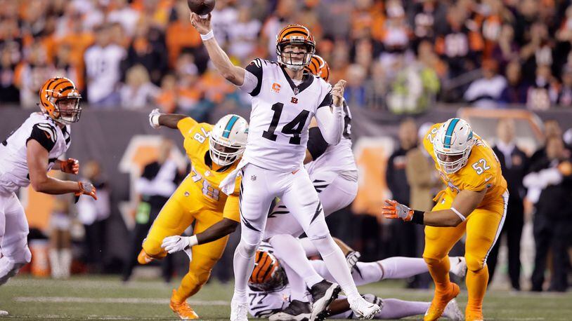 CINCINNATI, OH - SEPTEMBER 29: Andy Dalton #14 of the Cincinnati Bengals throws a pass during the second quarter of the game against the Miami Dolphins at Paul Brown Stadium on September 29, 2016 in Cincinnati, Ohio. (Photo by Andy Lyons/Getty Images)