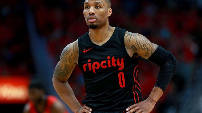FILE PHOTO: Damian Lillard #0 of the Portland Trail Blaers stands on the court as his team trails the New Orleans Pelicans during Game 3 of the Western Conference playoffs against the Portland Trail Blazers at the Smoothie King Center on April 19, 2018 in New Orleans, Louisiana. (Photo by Sean Gardner/Getty Images)