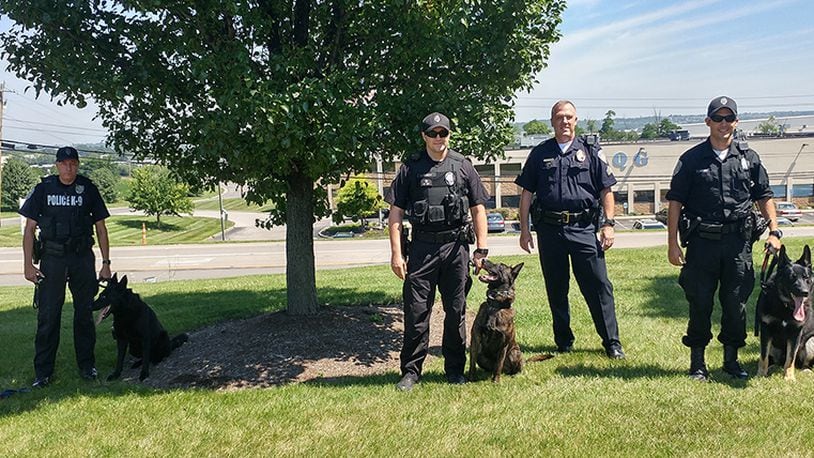 Pictured are Fairfield Police Department’s three K-9 units this past July. CONTRIBUTED