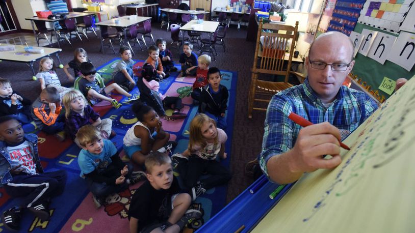 In this 2015 file photo, Pat Thompson teaches his kindergarten class at Miller Ridge Elementary School in Middletown. NICK GRAHAM/2015