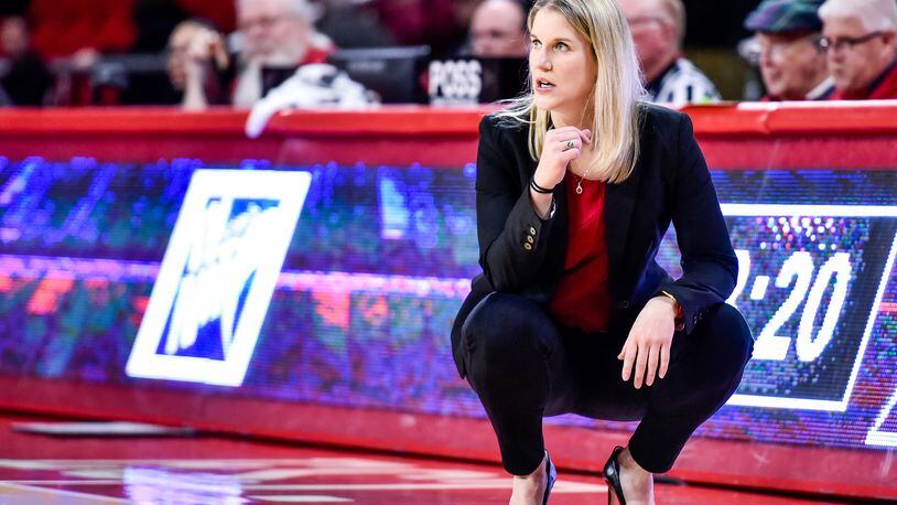Miami women’s basketball coach Megan Duffy cheers on her team against Duquense on Thursday, March 15, 2018, at Millett Hall in Oxford. NICK GRAHAM/STAFF