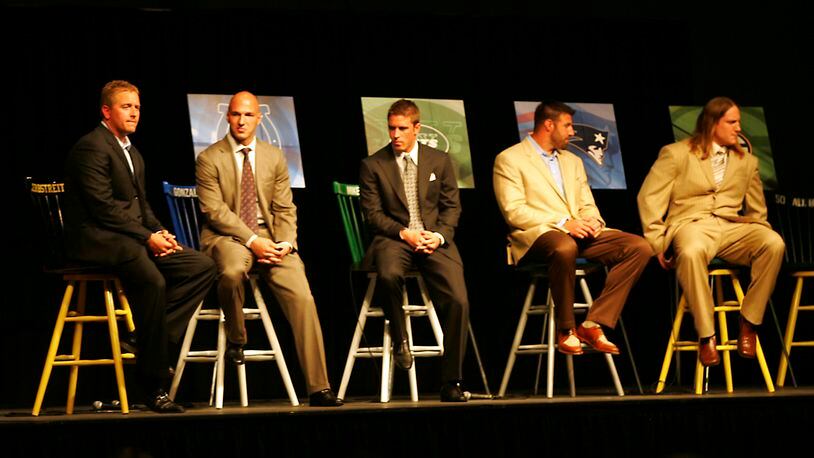 L-R: Centerville Alum, OSU QB and ESPN college football analyst Kirk Herbstreit, former OSU player and current Indianapolis Colt Anthony Gonzalez, former Centerville, OSU, and current NY Jet kicker Mike Nugent, former OSU and current New England Patriot Mike Vrabel, and former Centerville, OSU and current Green Bay Packer A.J. Hawk  sit onstage during the Sonny Unger Foundation Program at the Dayton Convention Center Wednesday evening. Photo by Jim Witmer