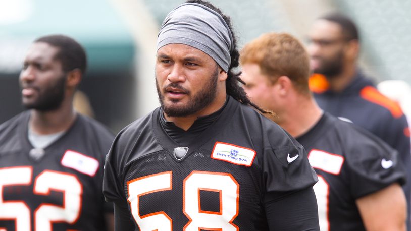 Linebacker Rey Maualuga (58) walks off the field after the first day of Cincinnati Bengals minicamp held at Paul Brown Stadium, Tuesday, June 10, 2014. GREG LYNCH / STAFF