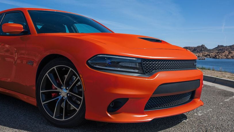 The 2017 Dodge Charger SXT has all the looks of a muscle car with ample power, but also adds all-wheel drive practicality and keeps this car in contention as a decent choice of a family vehicle. (Dodge photo)
