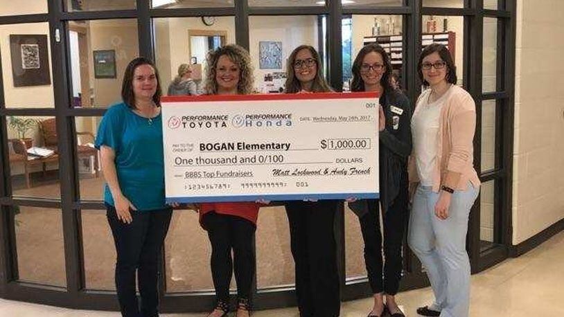 Performance Honda and Performance Toyota jointly awarded Bogan Elementary School with a $1,000 check during Bogan’s end of year Award Ceremony. Pictured is Maria Lyons, Bogan Elementary; Kathy Snider of Performance Toyota and Honda, and Valerie Frech, Megan Kolida; and Kara Love of Big Brothers Big Sisters of Butler County. CONTRIBUTED