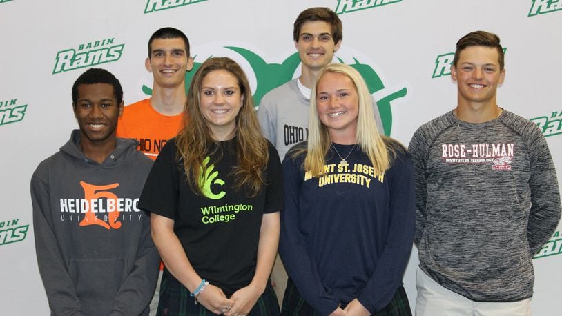 Six Badin High School student-athletes made their collegiate choices official during a recent ceremony at the school. They are (front from left) Kyle Manuel (cross country and track, Heidelberg), Karley Schlensker (volleyball, swimming, Wilmington), Olivia Keene (basketball, Mount St. Joseph), A.J. Ernst (baseball, Rose-Hulman) and (back from left) Matt Schweinefuss (soccer, Ohio Northern) and Sam Krabacher (cross country, track, Ohio Northern). SUBMITTED PHOTO