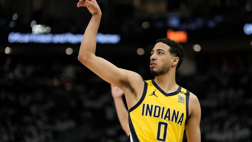 Indiana Pacers' Tyrese Haliburton reacts to his three pointer during the second half of Game 2 of the first round NBA playoff basketball series against the Milwaukee Bucks Tuesday, April 23, 2024, in Milwaukee.The Pacers won 125-108 to tie the series 1-1. (AP Photo/Morry Gash)