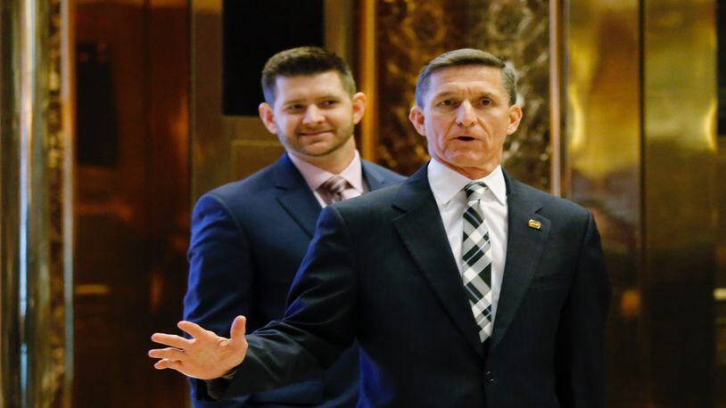 National security advisor Michael Flynn is seen with his son, Michael Flynn Jr., arriving at the Trump Tower for meetings with then US President-elect Donald Trump, in New York on November 17, 2016. (EDUARDO MUNOZ ALVAREZ/AFP/Getty Images)