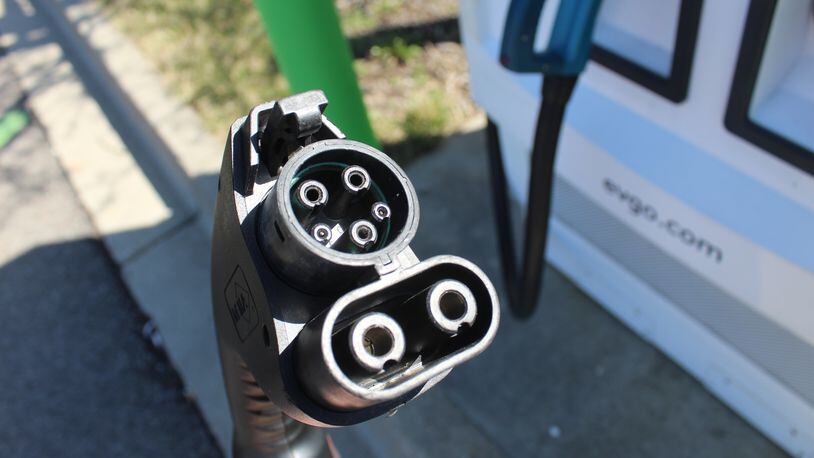 The plug on a high-speed charging station that can charge an electric vehicle in less than hour compared to overnight for a regular home charging station. CONTRIBUTED