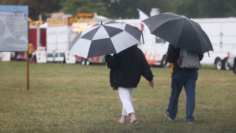Rain and storms caused the early closure Friday of the Ohio Challenge hot air balloon festival in Middletown. GREG LYNCH/STAFF