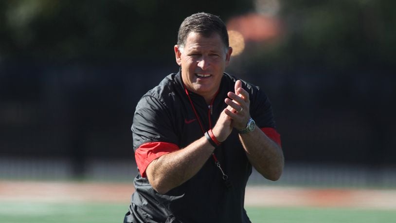 Ohio State’s Greg Schiano claps during practice on Saturday, Aug. 5, 2017, at the Woody Hayes Athletic Center in Columbus. David Jablonski/Staff
