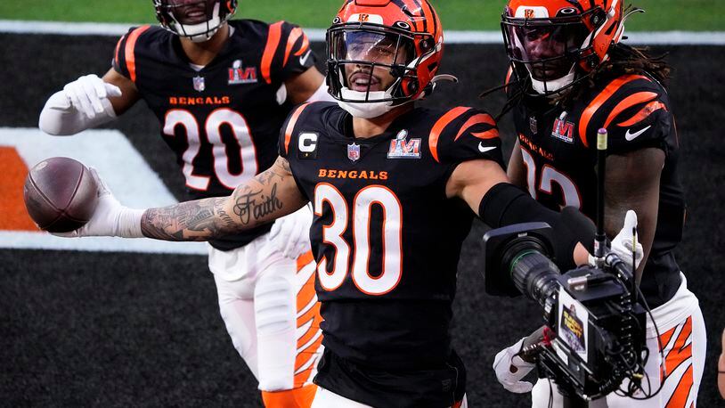 Cincinnati Bengals free safety Jessie Bates III (30) celebrates his interception against the Los Angeles Rams during the first half of the NFL Super Bowl 56 football game Sunday, Feb. 13, 2022, in Inglewood, Calif. (AP Photo/Elaine Thompson)