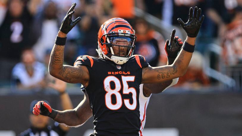 Cincinnati Bengals wide receiver Tee Higgins (85) celebrates a touchdown against the Atlanta Falcons in the second half of an NFL football game in Cincinnati, Fla., Sunday, Oct. 23, 2022. (AP Photo/Aaron Doster)
