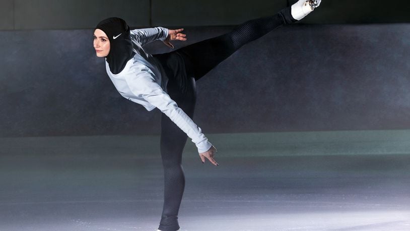 In this undated image provided by Nike, figure skater Zahra Lari model wears Nike's new hijab for Muslim female athletes. (Nike via AP)
