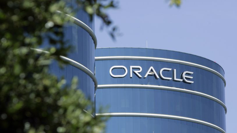 FILE - This June 26, 2007 file photo shows the exterior of Oracle Corp. headquarters in Redwood City, Calif. Oracle Corp.'s planned campus in Nashville, Tenn. will serve as the computer technology giant's world headquarters, placing it in a city that's a center of the health care industry, CEO Larry Ellison said. (AP Photo/Paul Sakuma, File)
