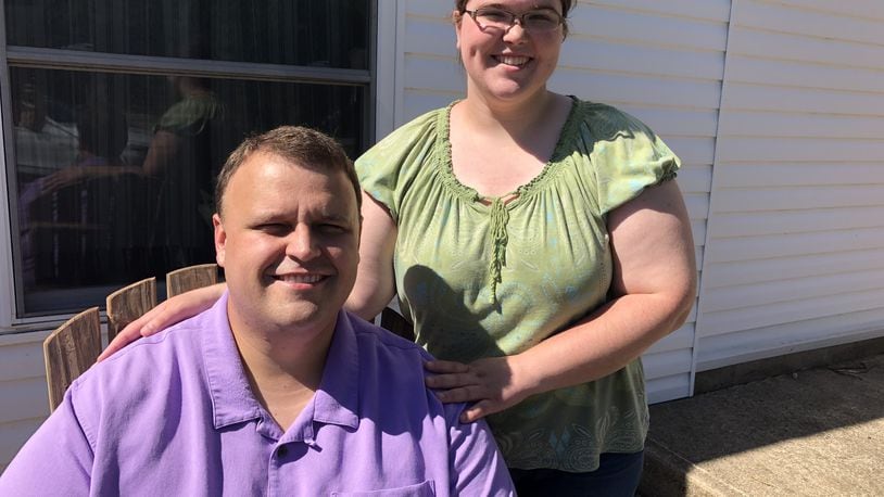 Nick and Kara Goodwin, of Fairfield, are holding a fundraiser Saturday in hopes of raising funds to offset the cost of adopting a baby. RICK McCRABB/STAFF