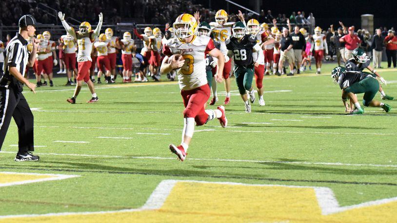Fenwick’s Jack Fessler heads into the end zone for one of his five touchdowns Friday night in a 57-26 triumph over McNicholas at Penn Station Stadium in Cincinnati. CONTRIBUTED PHOTO BY ANGIE MOHRHAUS