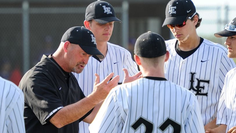 Lakota East coach Ray Hamilton instructs his players between innings of a game against Middletown on April 20, 2016. Host East won 6-4. NICK GRAHAM/STAFF