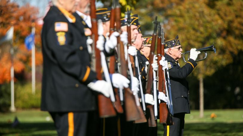 Members of the American Legion Post 218 perform a 21 gun salute and Taps during the annual observance of Veteran’s Day in Middletown, Friday, Nov. 11, 2016. GREG LYNCH / STAFF