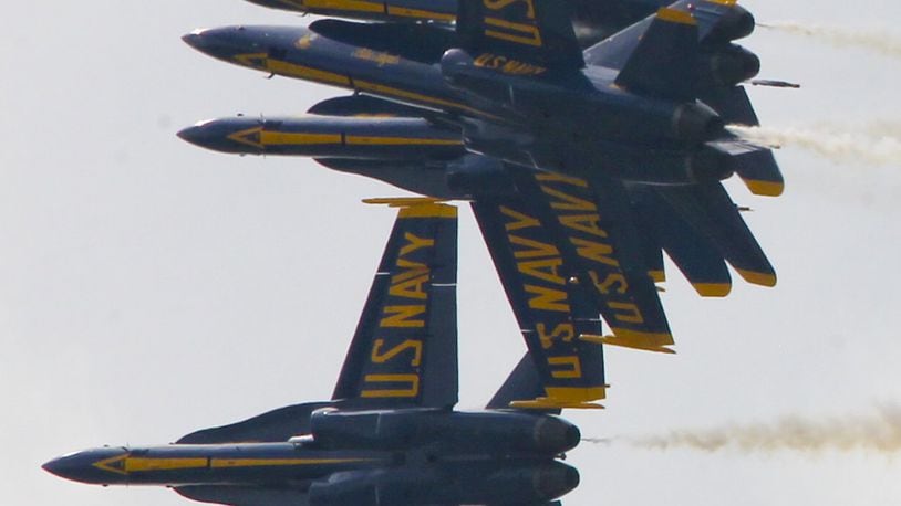 The U.S. Navy Blue Angels perform during the Vectren Dayton Air Show held at the Dayton International Airport, Sunday, June 29, 2014. GREG LYNCH / STAFF