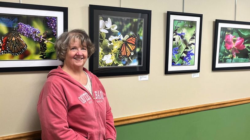The Middletown Arts Center (MAC), in collaboration with Butler Behavioral Health (BBH), will launch a satellite art exhibition that features the work of Bev Brewer Stolzenberger. Pictured is Bev at the exhibit installation. CONTRIBUTED