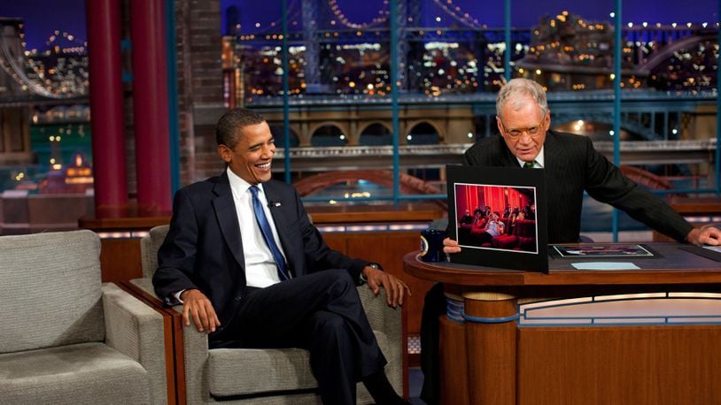 Former U.S. President Barack Obama talked to host David Letterman (R) during a taping of "The Late Show with David Letterman" at the Ed Sullivan Theater on September 21, 2009 in New York City.