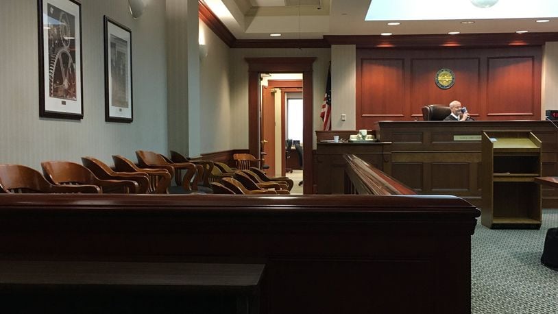 Many cases were continued through paper orders rather than calling cases in open court Monday in Butler County Common Pleas Judge Greg Stephen’s court due to coronavirus concerns. The usually crowded courtrooms were nearly empty. LAUREN PACK/STAFF