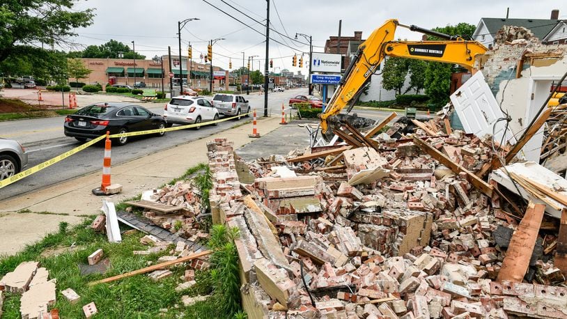 The need for construction workers is high on the jobs list. The former Wolpert insurance agency is among buildings demolished this summer to make way for soon-to-come improvements to the crossroads of Main Street with Eaton and Millville Avenues. NICK GRAHAM/STAFF