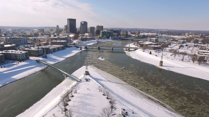 The city of Dayton is demanding the Air Force act more urgently to prevent the potential of groundwater contamination from the base to the city’s Huffman Dam well field along the Mad River. In this photo, ice flows down the Great Miami River, right at the confluence with the Mad River at Deeds Point. TY GREENLEES/STAFF