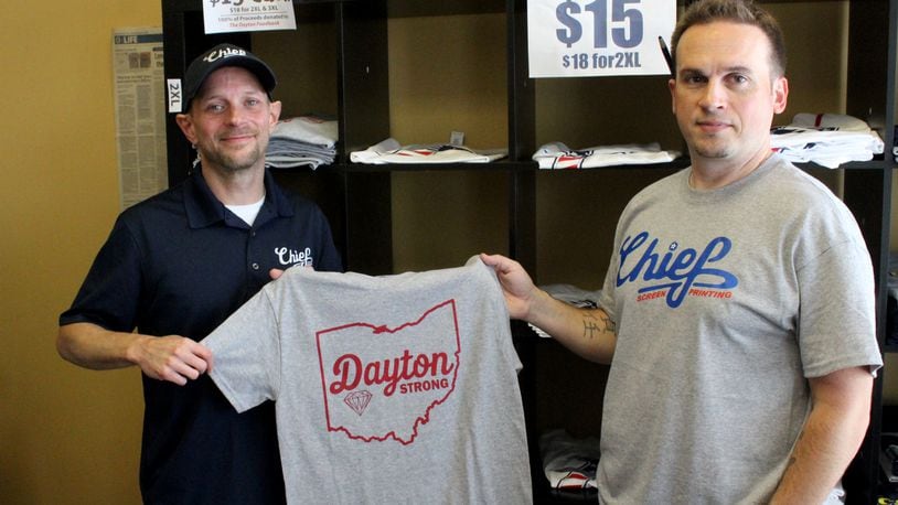 Chief Screen Printing  owners Anthony Tomlinson (right)  and James Webster (left)  have raised nearly $5,500 through the sale of Dayton Strong T-shirts.