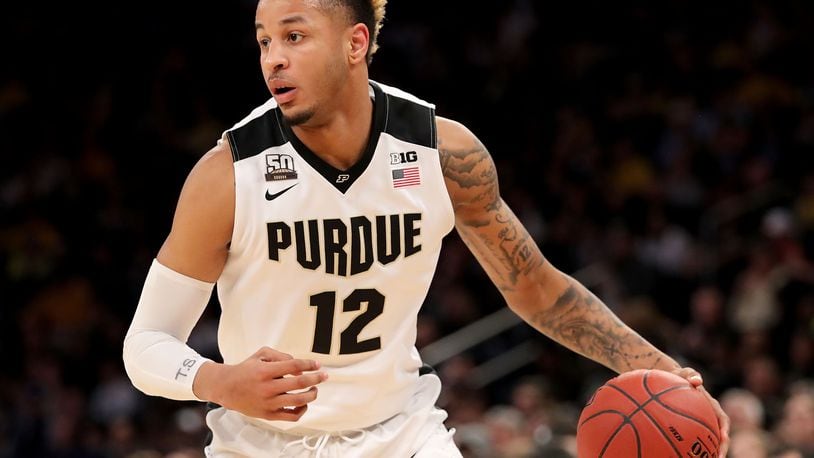 NEW YORK, NY - MARCH 03: Vincent Edwards #12 of the Purdue Boilermakers works down the court in the first half against the Penn State Nittany Lions during semifinals of the Big 10 Basketball Tournament at Madison Square Garden on March 3, 2018 in New York City. (Photo by Abbie Parr/Getty Images)