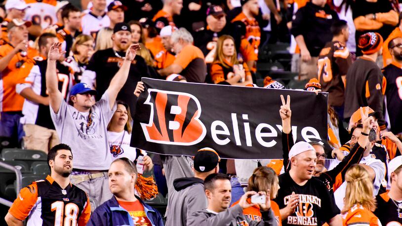 Cincinnati Bengals fans cheer after they beat the Cleveland Browns 31-10 Thursday, Nov. 5 at Paul Brown Stadium in Cincinnati. The Bengals are now 8-0 on the season.  NICK GRAHAM/STAFF