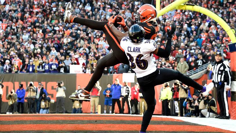 CLEVELAND, OHIO - DECEMBER 22: Demetrius Harris #88 of the Cleveland Browns catches a one yard touchdown pass thrown by Baker Mayfield #6 against Chuck Clark #36 of the Baltimore Ravens during the second quarter in the game at FirstEnergy Stadium on December 22, 2019 in Cleveland, Ohio. (Photo by Jason Miller/Getty Images)