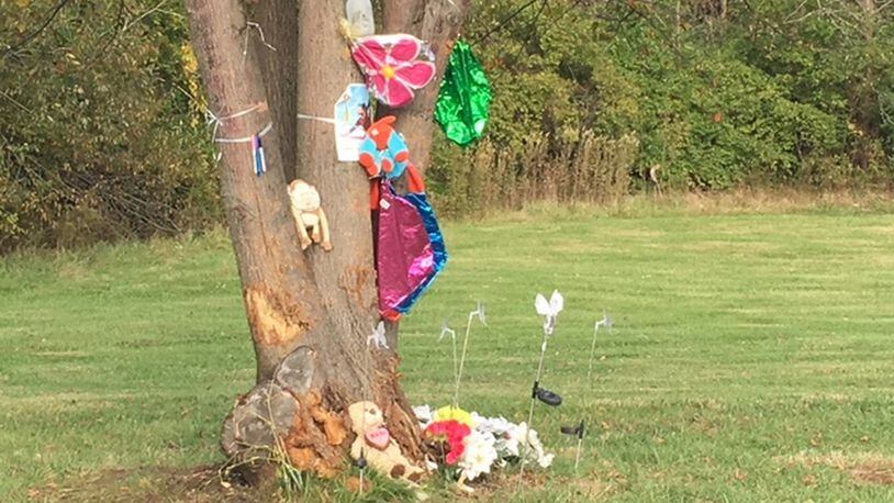 A makeshift memorial stands on North Bickett Road near U.S. 42 in Wilberforce, where Wilberforce University student Alexandria Austin was killed in a Sept. 26 crash. Richard Wilson/Staff