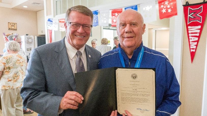 State Senator Steve Wilson presents Otterbein resident Bob Arledge with a Senatorial Citation.