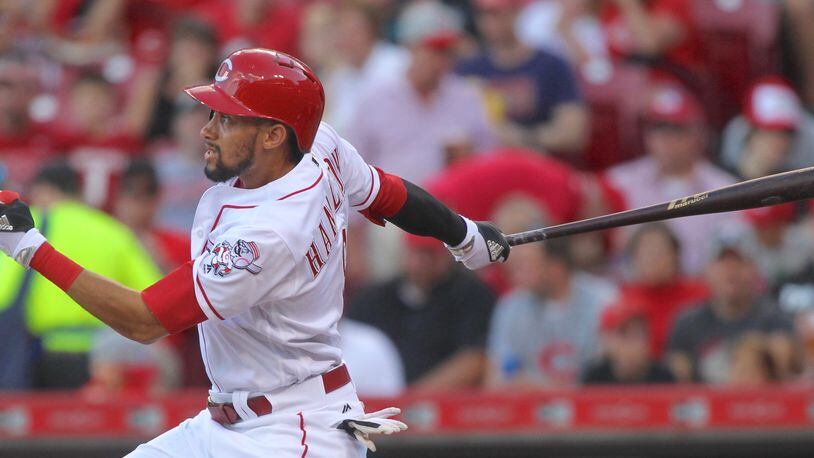 The Reds’ Billy Hamilton hits a home run in the first inning against the Brewers on Tuesday, June 27, 2017, at Great American Ball Park in Cincinnati. David Jablonski/Staff