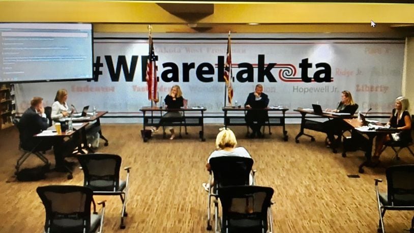 During the Lakota school board's Monday evening, virtual meeting (pictured), district officials reported the opening of classes under the coronavirus went smoothly. Board members also started process to fill a vacant seat. (Photo By Michael D. Clark\Journal-News)