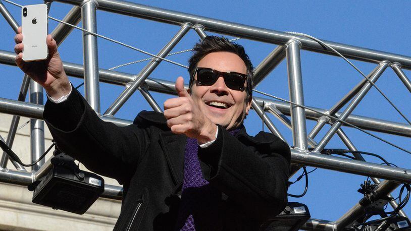 Comedian Jimmy Fallon gives a thumbs up on Central Park West during the annual Macy's Thanksgiving Day parade on November 23, 2017 in New York City. The Macy's Thanksgiving Day parade is the largest parade in the world and has been held since 1924. (Photo by Stephanie Keith/Getty Images)