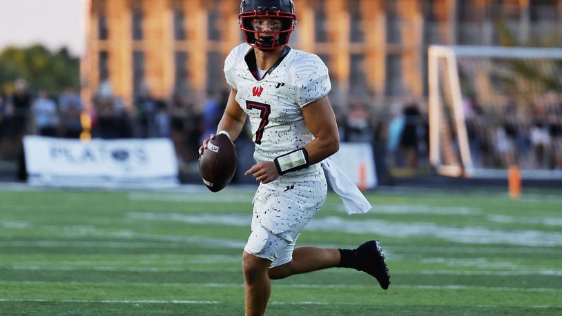 Lakota West quarterback Mitch Bolden, pictured here earlier this season, tossed a touchdown pass and rushed for 100 yards in Friday's loss to Moeller in the Division I, Region 4 final. NICK GRAHAM/STAFF