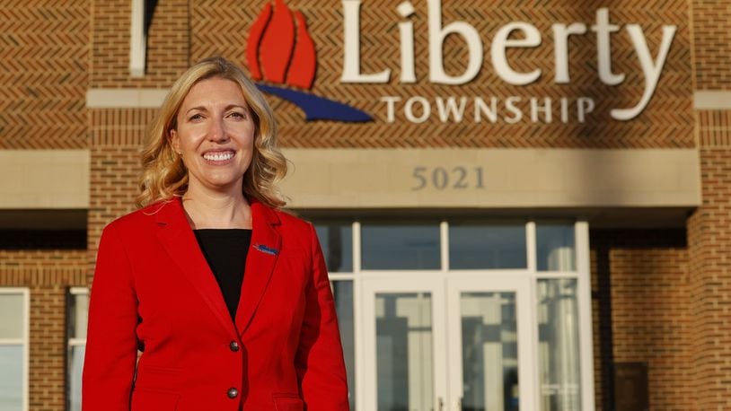 Jesse Lightle was voted in as new Liberty Township administrator this week. Lightle, who was administrator for the Dayton-area’s Washington Twp., will earn $173,500 annually and she began working soon after the township's trustees unanimously voted to hire her.  NICK GRAHAM/STAFF