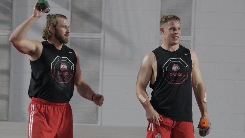 Ohio State football players Craig Fada (left) and Joe Burger at a sport performance summit this summer. Buckeye football players are involved in sports research with the 711th Human Performance Wing at Wright-Patterson Air Force Base. CONTRIBUTED