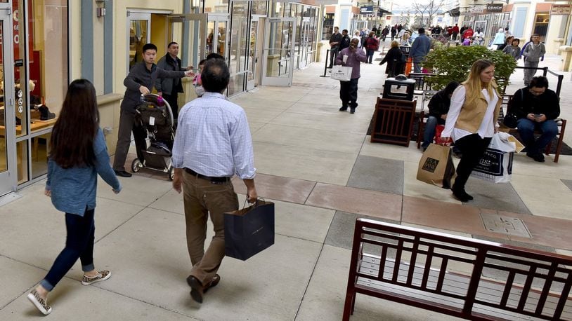 FILE: Shoppers look for Black Friday deals at Cincinnati Premium Outlets in Monroe. NICK GRAHAM/STAFF