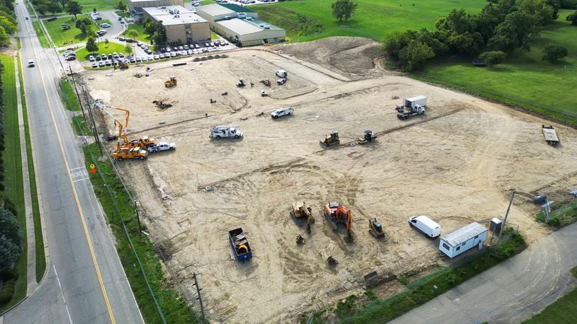 Construction continues on the parking lot at Badin High School on Wednesday, Aug. 30, 2023, in Hamilton. NICK GRAHAM/STAFF