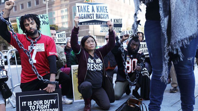 Ann Arbor City Council member Sumi Kailasapathy said her act of taking a knee was in response to racial inequality. Demonstrators in New York echoed the same sentiments in a recent rally.