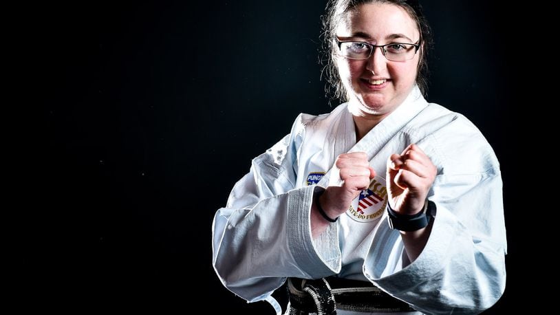 2005 Lakota East High School graduate Jamie Druhan Green, the reigning U.S. para karate national champion in kata in the women’s over-18 intellectually disabled division, will be leaving soon to compete with Team USA for the 2018 World Karate Federation World Championship in Madrid, Spain. She trains and helps instruct classes at Buckner Martial Arts in West Chester Township. NICK GRAHAM/STAFF