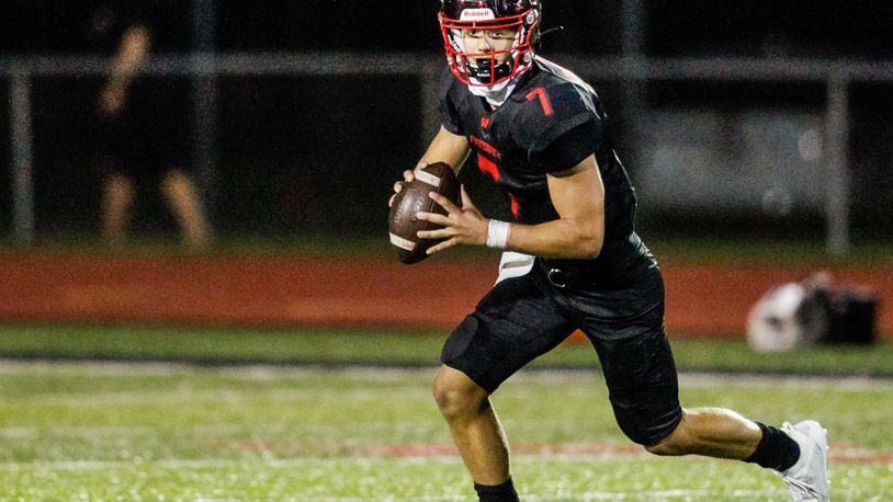 Lakota West quarterback Mitch Bolden had a hand in three touchdowns Friday as Lakota West beat district rival Lakota East 31-14 in a Division I, Region 4 playoff quarterfinal. NICK GRAHAM / FILE