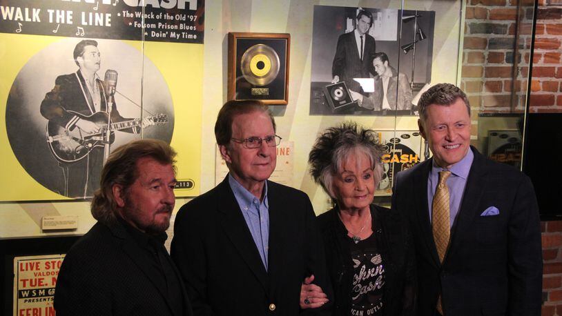 Sun Records' Jerry Phillips, Tommy Cash, Joanne Cash-Yates and WSM's Bill Cody at the Johnny Cash Museum ceremony unveiling Johnny Cash’s first gold record for his first No. 1 record "I Walk the Line."