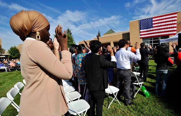 PHOTOS: Nearly 400 people have become naturalized citizens at Miami Hamilton