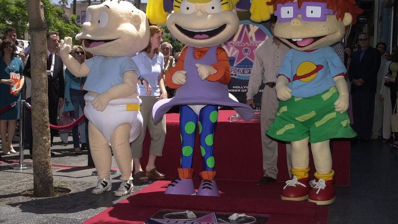 'Rugrats' characters, from left, Tommy Pickles, Angelica and Chuckie Finster attend a ceremony honoring the animated children''s show 'Rugrats' with a star on the Hollywood Walk Of Fame June 28, 2001 in Hollywood, CA. (Photo by Vince Bucci/Gettty Images)