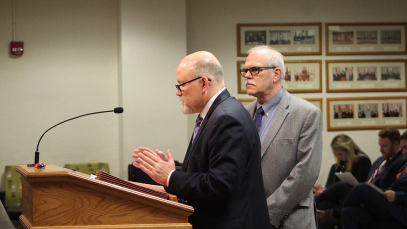 Public Health Commissioner Jeff Cooper and Dr. Michael Dohn pictured speaking last week about the outbreak. FILE